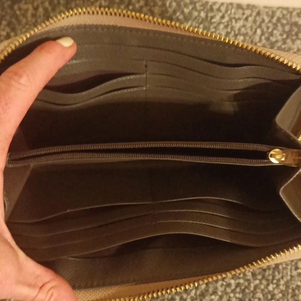 Coach gold pebbled leather accordion wallet